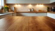 © ankai - Empty wooden table in the kitchen, blurred background, modern interior style, background for the presentation of products, food, recipes. copy space