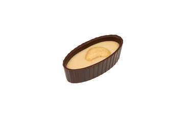 Wall Mural - Chocolate candy with a nut isolated on a white background.