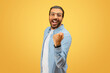 © Prostock-studio - Excited man with raised fist exuding happiness