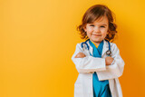 Fototapeta  - toddler as a doctor on bright background