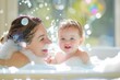 happy Mother and baby bonding, mommy and infant taking a bath in soap