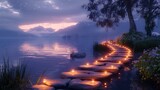 Fototapeta Natura - Serene twilight pathway lit by candles over water.