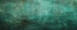 Emerald barely noticeable color on grunge texture cement background pattern with copy space