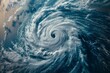 Aerial perspective of a powerful cyclone swirling over blue ocean waters, showcasing nature's dynamic patterns