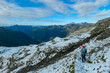 © Chris - Hiker woman on alpine meadow with panoramic view of majestic mount Polinik in High Tauern National Park, Carinthia, Austria. Idyllic hiking trail in Austrian Alps. Wanderlust paradise Mallnitz
