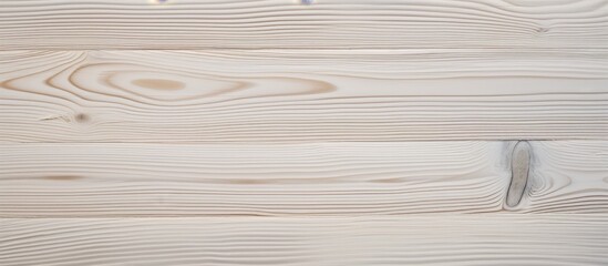 Poster - A detailed view of a wooden surface showing a prominent knot at one end, showcasing the natural beauty and texture of the wood