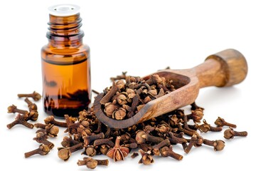 Essential oil infused dried cloves in a bottle against a white background