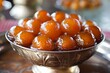 Indian sweet Gulab Jamun in sugary syrup