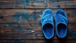 Top view cute blue slop sandals copy space on wood background. Generated AI image