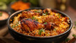  A bowl of colorful biryani with chicken, rice and spices. The chicken on top has been cooked to perfection and is rich with golden brown color and texture