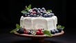 Single-tier cake with a textured buttercream finish adorned with delicate sugar pearls and fresh berries.