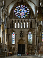 Wall Mural - Lincoln Cathedral, Roman Catholic Gothic church and cathedral with stain glass window corridor and hall, with arches, columns, pews, vault, aisles, gallery, arcades and clerestory.