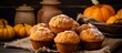 A variety of delicious muffins arranged closely together on a wooden table, showcasing different flavors and textures