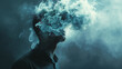 © Domingo - The concept of the disease of Alzheimer, forgetting memories and memory, and mental health issues, symbolized by the blurred head of a man obscured by dense smoke.