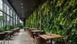 Eco-friendly cafe or restaurant interior with living green wall, vertical garden in biophilic design style
