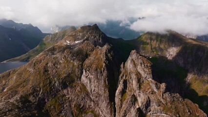 Wall Mural - Aerial view of Segla mountain above the sky, Norway during summer