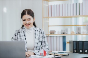 Wall Mural - Businesswoman or sales representative presenting a home purchase contract to buy a house or apartment and mortgage, money and finance concept. Buy or sell mortgaged real estate