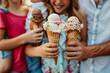 girls are smiling and holding ice cream cones. They are happy and enjoying their time together. The scene is set in a public area, possibly a park or a street, where people can gather