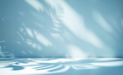 Wall Mural - Minimalist light blue background for product presentation, with delicate shadows cast by tree branches on the wall. Made with generative AI technology.