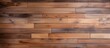 Detailed view of a weathered wooden wall displaying a rich brown stain finish, adding a rustic charm to the background