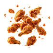 Fried chicken nuggets with crumbs falling.
