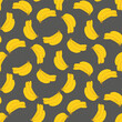 Seamless background of yellow bananas hand-drawn