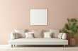 A beige and Scandinavian-style sofa accompanied by a white blank empty frame for copy text, all against a soft color wall background.