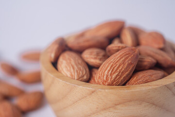 Almond snack fruit in wooden bowl