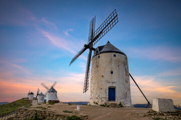 Wall Mural - View of the Consuegra windmill complex, Toledo, Castilla la Macha, Spain, at dusk