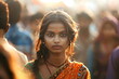 portrait of indian young woman on street, crowd of people in background