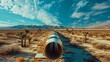 A long pipe is in the desert with a blue sky in the background. The sky is clear and the sun is shining