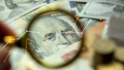 Poster - Growing graphs and charts on a background of fiat banknotes and coins. A magnified portrait of Franklin on the 100 dollars bill.