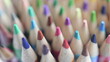 © H_Ko - Many multicolored wooden sharp pencils for drawing closeup background. Learning lessons concept
