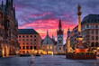 The beautiful old town of Munich, Germany, with Town Hall at the Marienplatz Square during a fiery sunrise