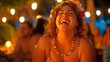 An gorgeous, chubby white woman laughing during a nighttime beach party