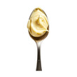 © Sascha - A spoonful of cream is shown on a white background