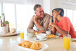 © Monkey Business - Mature Couple On Vacation Or At Home Eating Breakfast Together