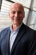 © .shock - Portrait of an Experienced Businessman in Modern Conference Setting