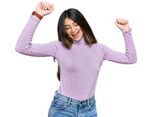 Poster - Young beautiful teen girl wearing turtleneck sweater dancing happy and cheerful, smiling moving casual and confident listening to music