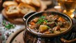 Bowl of Beef Stew With Bread and Parsley