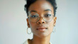 Close up portrait of young african american woman with eyeglasses