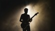 © THINGDSGN - Silhouetted guitar player performing on stage under dramatic lighting at night, smoky background,