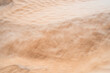 © skazar - wind on sand dune of the Sahara - southern Tunisia