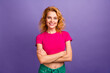 Photo of stunning cute woman wear trendy pink clothes crossed arms isolated on purple color background