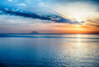 Scenic sunset with view over Stromboli Volcano from Tropea, Italy