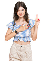 Poster - Young beautiful caucasian girl wearing casual clothes smiling swearing with hand on chest and fingers up, making a loyalty promise oath