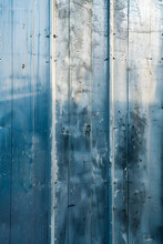 Textured Blue Metal Wall With Rust Stains And Weathering Effects Against Light Background