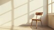 A simple wooden chair against a pristine white wall, casting a shadow