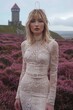 Beautiful girl in a white dress in a field of daisies, young beautiful woman in a field in a White dress, bride, wedding