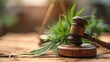 Judges Gavel and Marijuana Leaves on Wooden Table